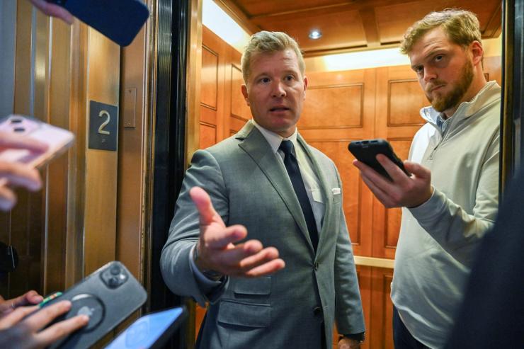 Sen. Tim Sheehy, R-Mont., at center