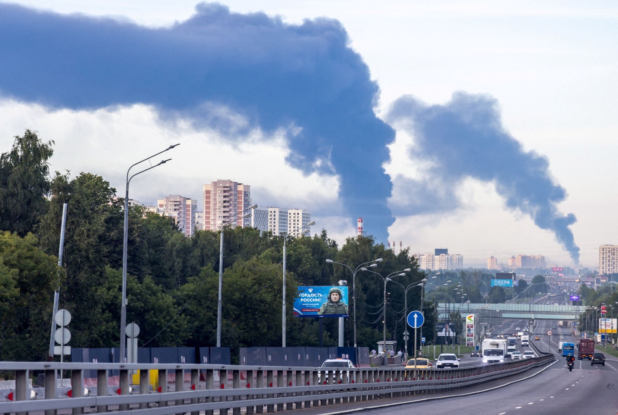 Smoke billows after Ukrainian drone attacks in Moscow. 