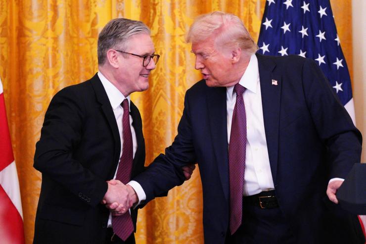 British Prime Minister Keir Starmer and U.S. President Donald Trump shake hands.