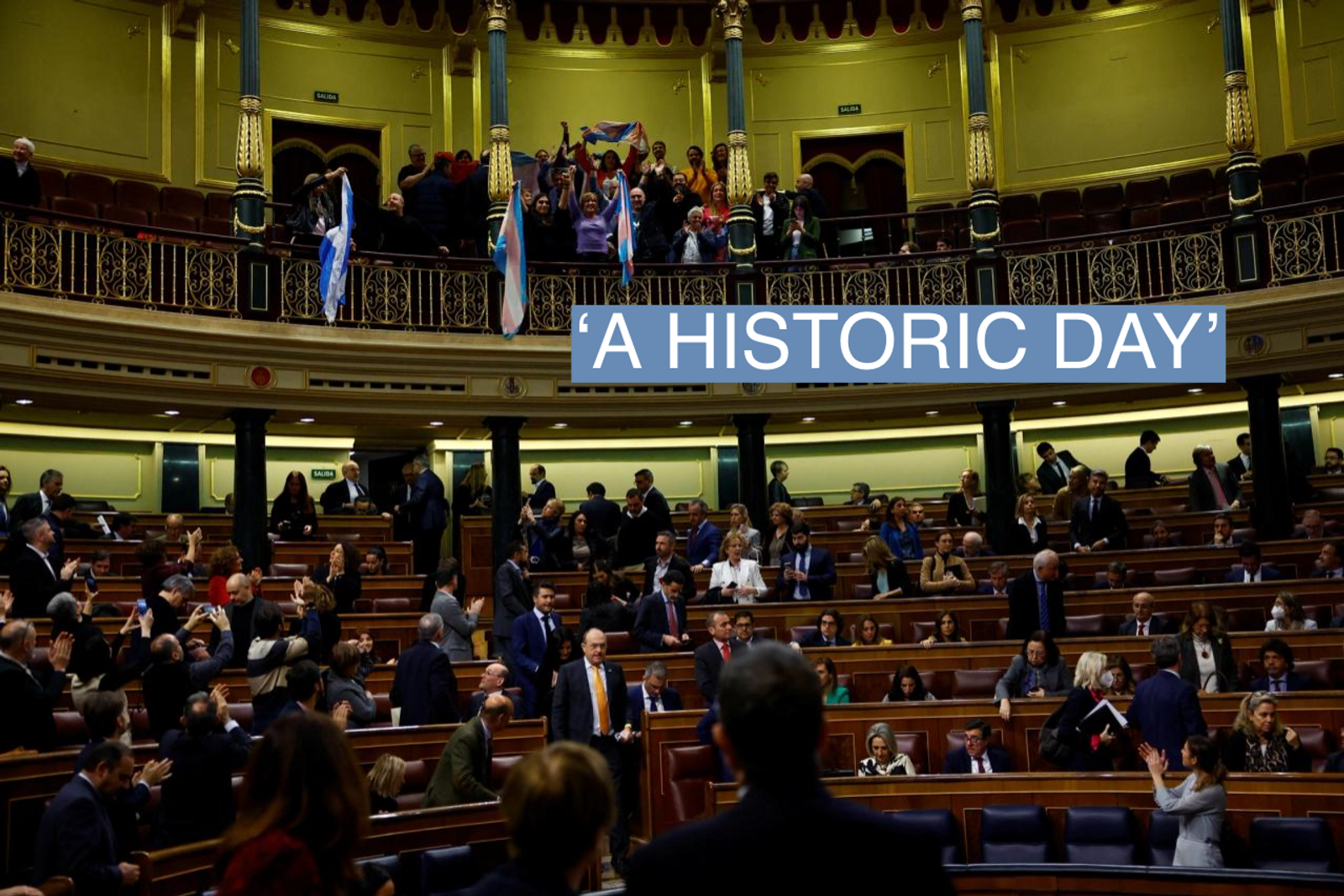 Spain's Minister for Equality Irene Montero claps as LGBT activists celebrate after a vote giving the final approval to a law that will make it easier for people to self-identify as transgender, at the Parliament in Madrid, Spain, February 16, 2023. 