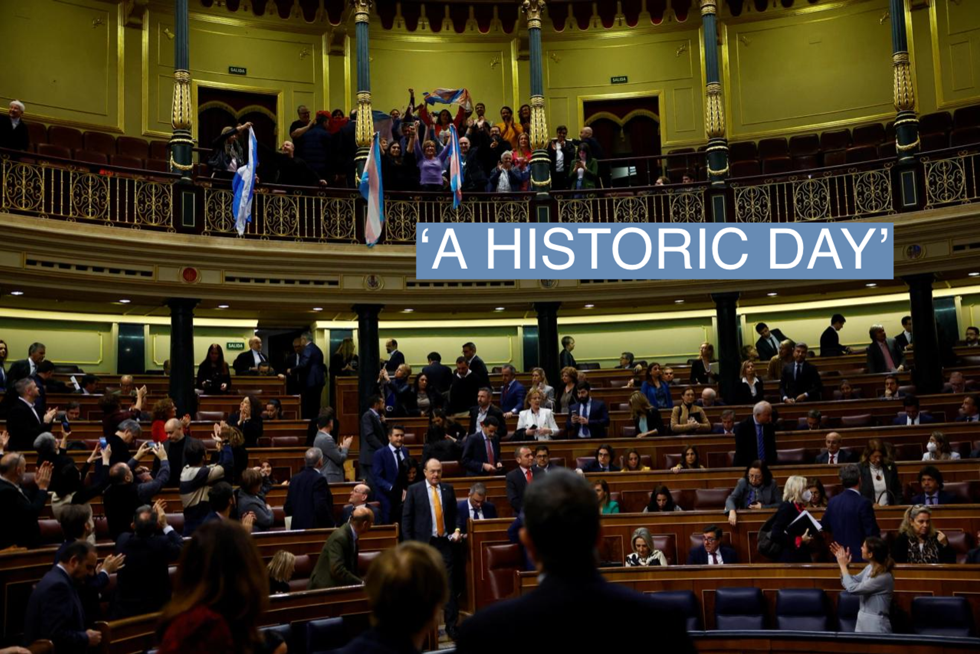 Spain's Minister for Equality Irene Montero claps as LGBT activists celebrate after a vote giving the final approval to a law that will make it easier for people to self-identify as transgender, at the Parliament in Madrid, Spain, February 16, 2023. 