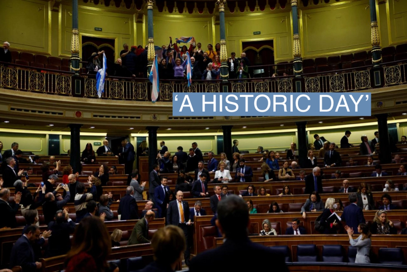 Spain’s Minister for Equality Irene Montero claps as LGBT activists celebrate after a vote giving the final approval to a law that will make it easier for people to self-identify as transgender, at the Parliament in Madrid, Spain, February 16, 2023.