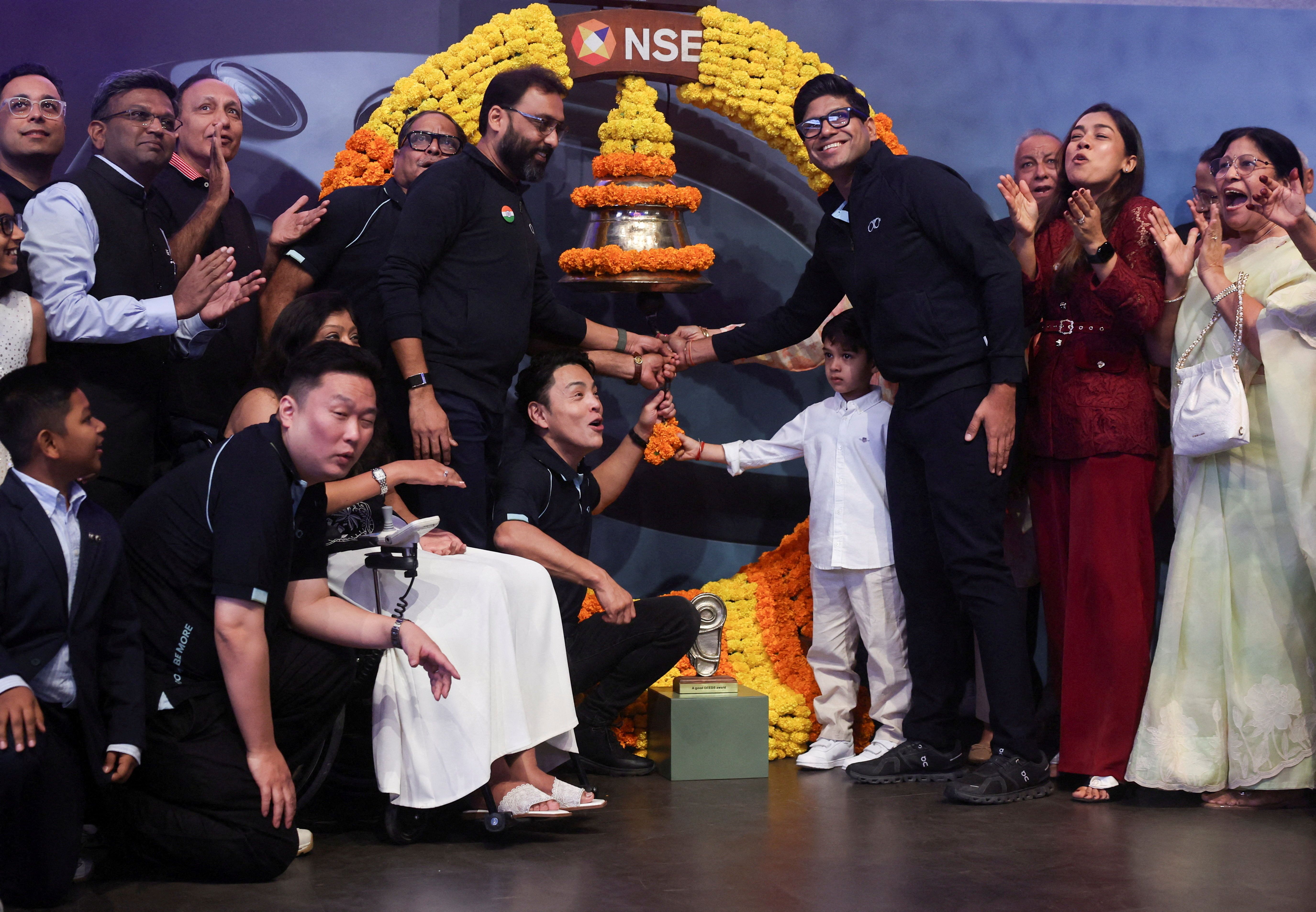 Peyush Bansal, Chief Executive Officer (CEO) of Lenskart Solutions Limited, rings the bell during the listing ceremony of the company’s IPO in Mumbai