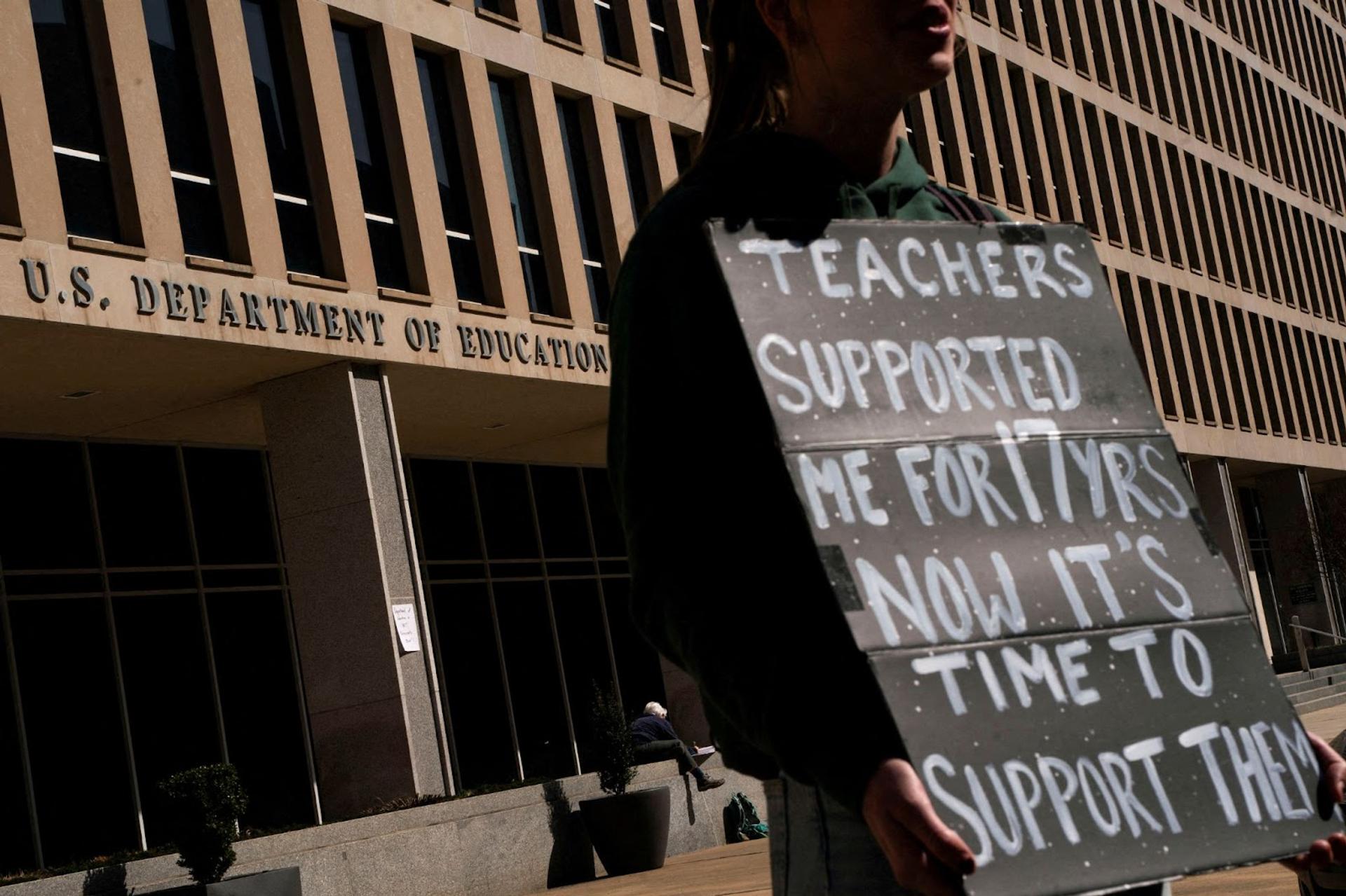 A protester outside the DoE