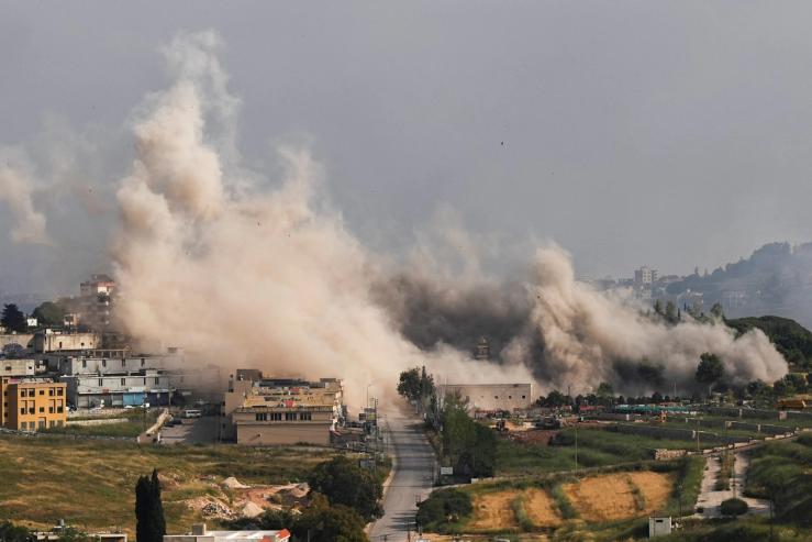 Smoke rises after a strike on Lebanon.