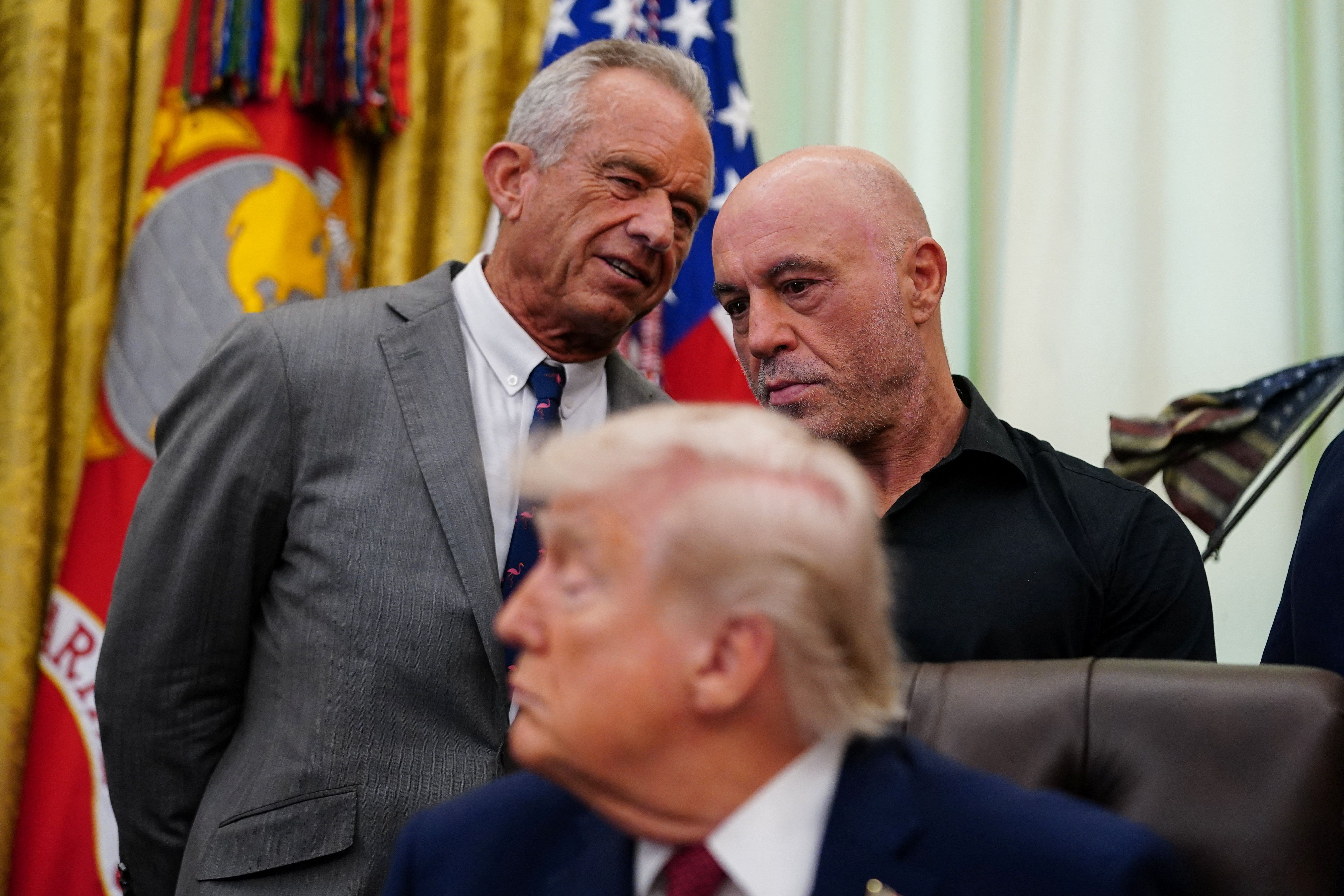 Joe Rogan speaks to HHS Secretary Robert F. Kennedy Jr. in the Oval Office