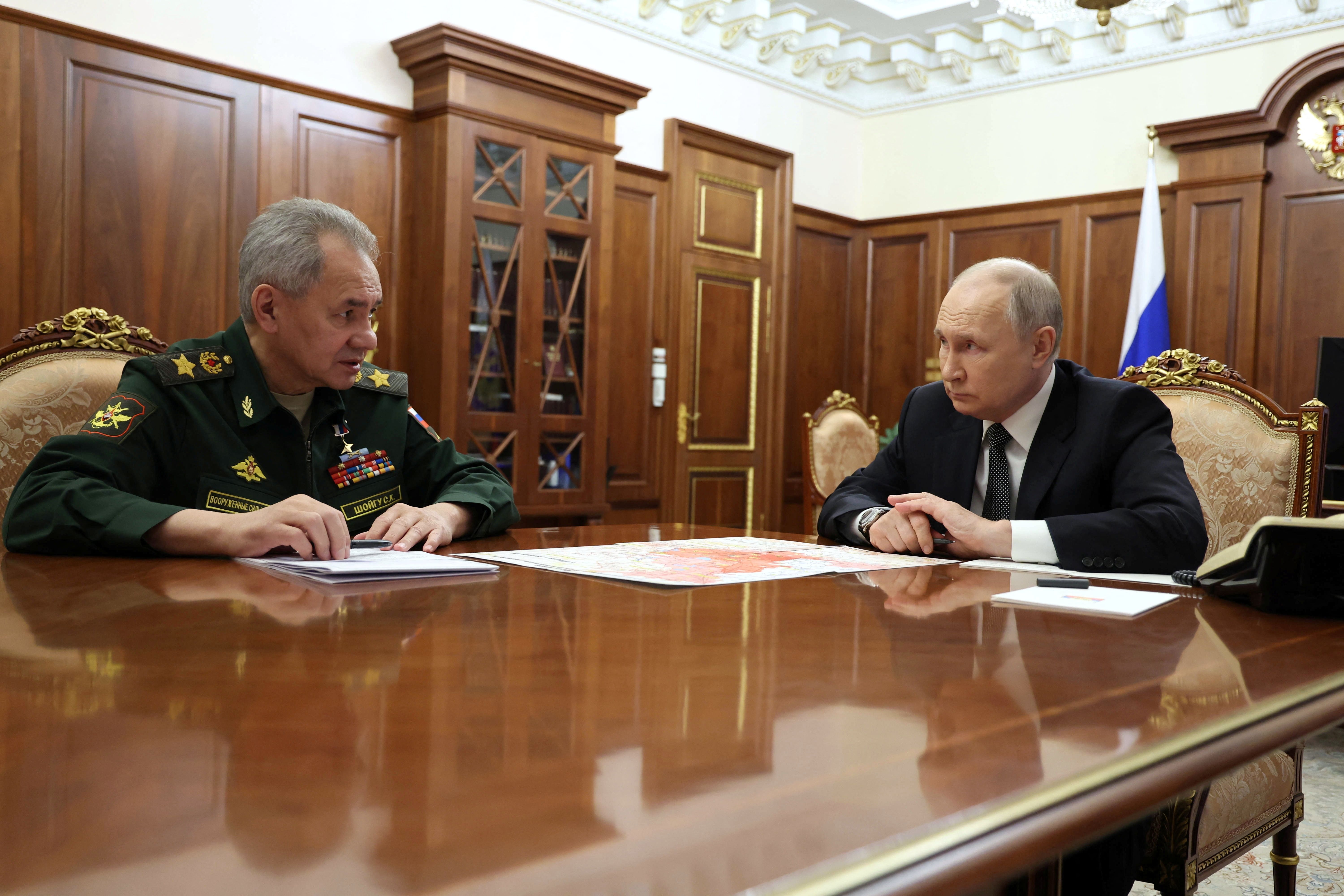 Russia’s President Vladimir Putin listens to Defence Minister Sergei Shoigu during a meeting in Moscow, Russia February 20, 2024.