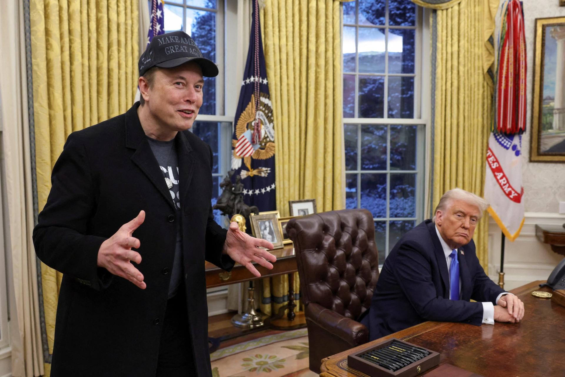 Elon Musk speaks next to US President Donald Trump in the Oval Office in February.