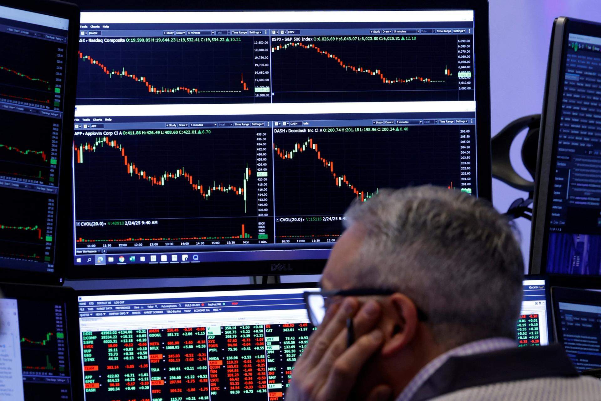 A trader works on the floor at the New York Stock Exchange.