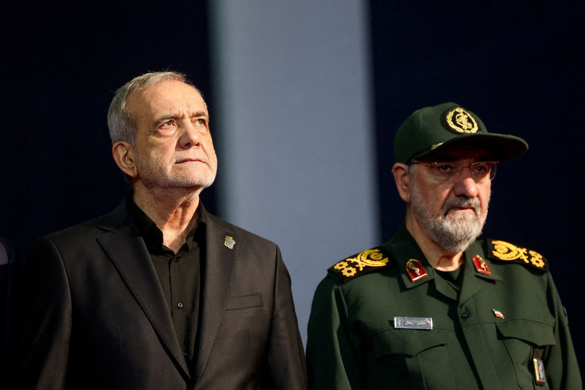 Iranian President Masoud Pezeshkian and Mohsen Rezaei, a hardliner who was recently appointed to Iran’s top national security position in a leadership reshuffle. 