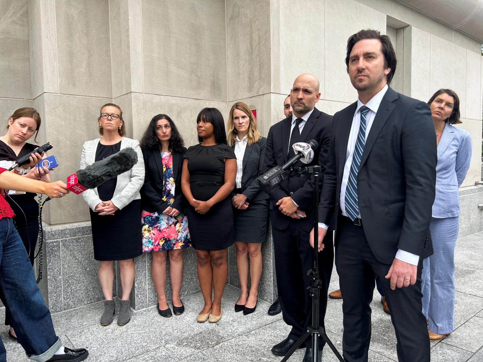Cody Wofsy, a lawyer with the American Civil Liberties Union (ACLU), stands outside the federal court in New Hamsphire.