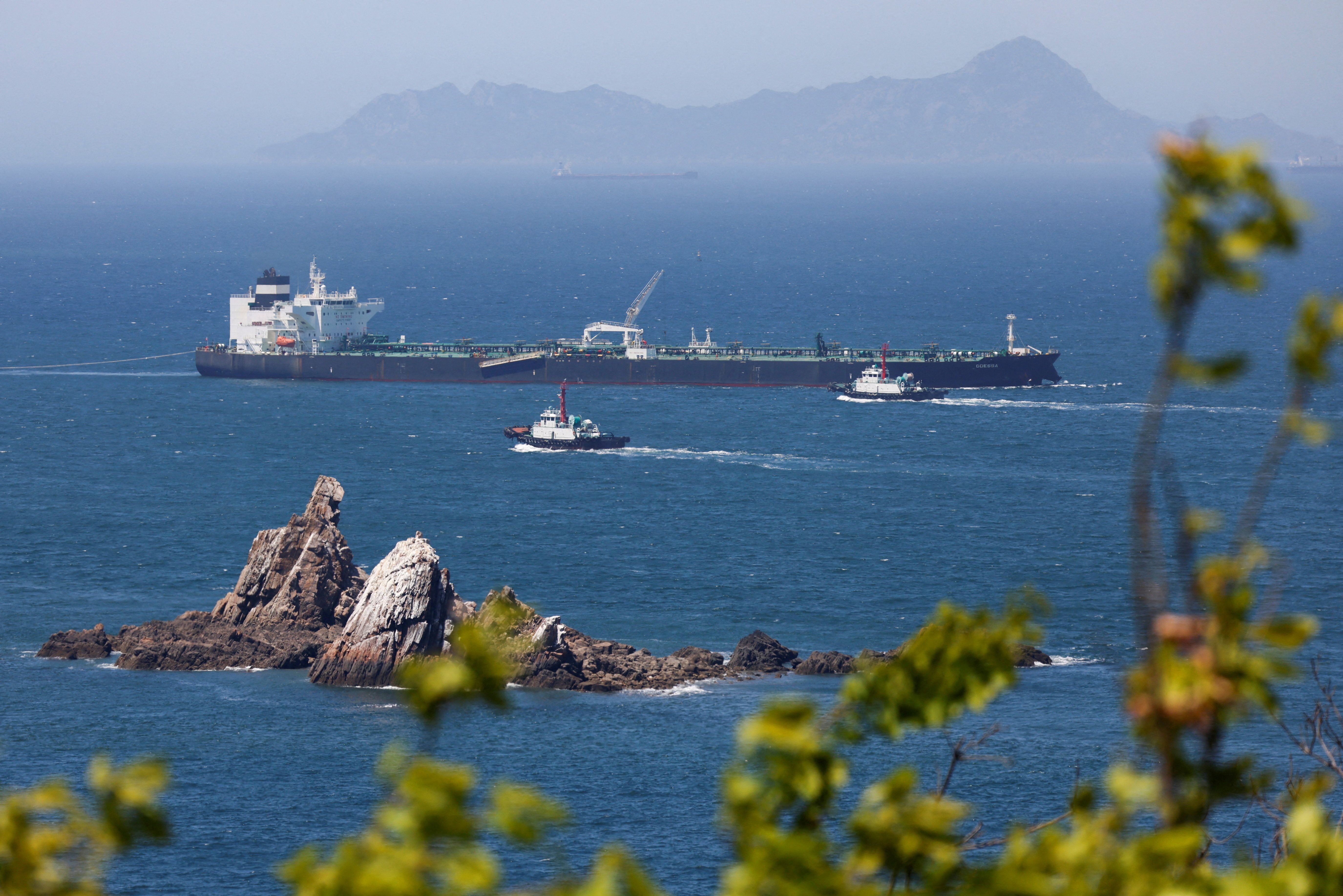 A cargo ship carries oil from UAE
