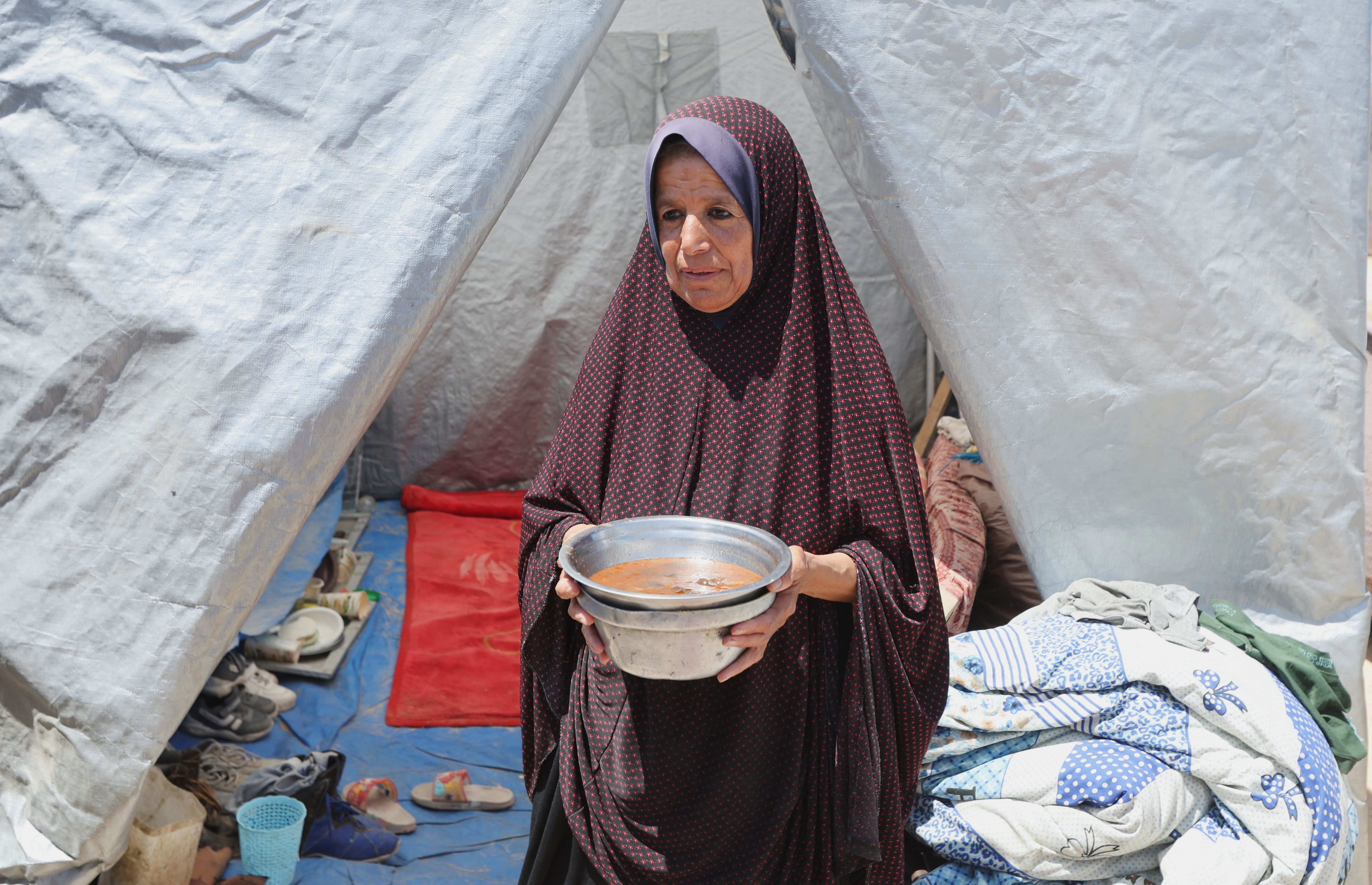 A woman in Gaza who told Reuters that she and her nine children had just one meal each day to share for a week.