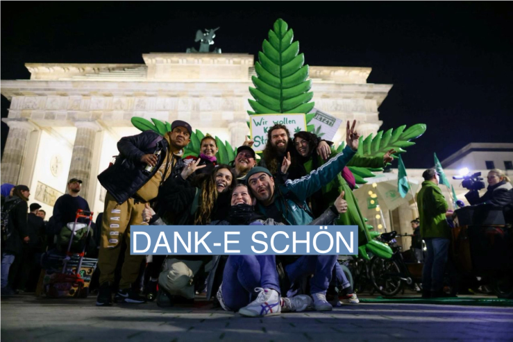 People pose for a picture as Germany’s friends of cannabis celebrate the part legalisation of cannabis starting on April 1 with a “smoke in” at Brandenburg Gate in Berlin, Germany,