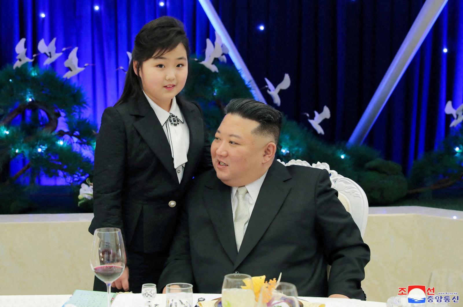 North Korean leader Kim Jong Un talks with his daughter Kim Ju Ae at a banquet to celebrate the 75th anniversary of the Korean People's Army the following day, in Pyongyang, North Korea February 7, 2023