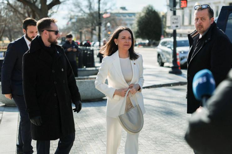 María Corina Machado arrives for a meeting at the White House