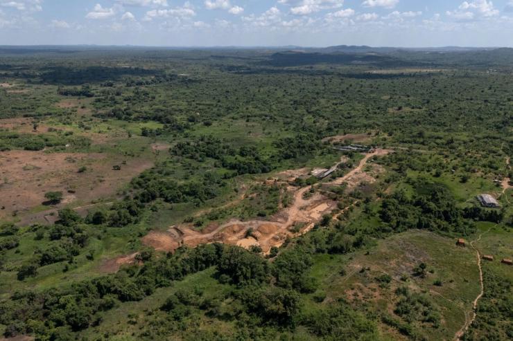Aerial view showing a mining site next to a forest reserve in Likasi.
