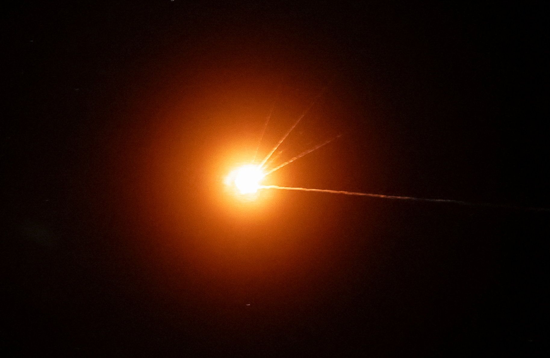 A Russian missile explodes upon being intercepted above Kyiv