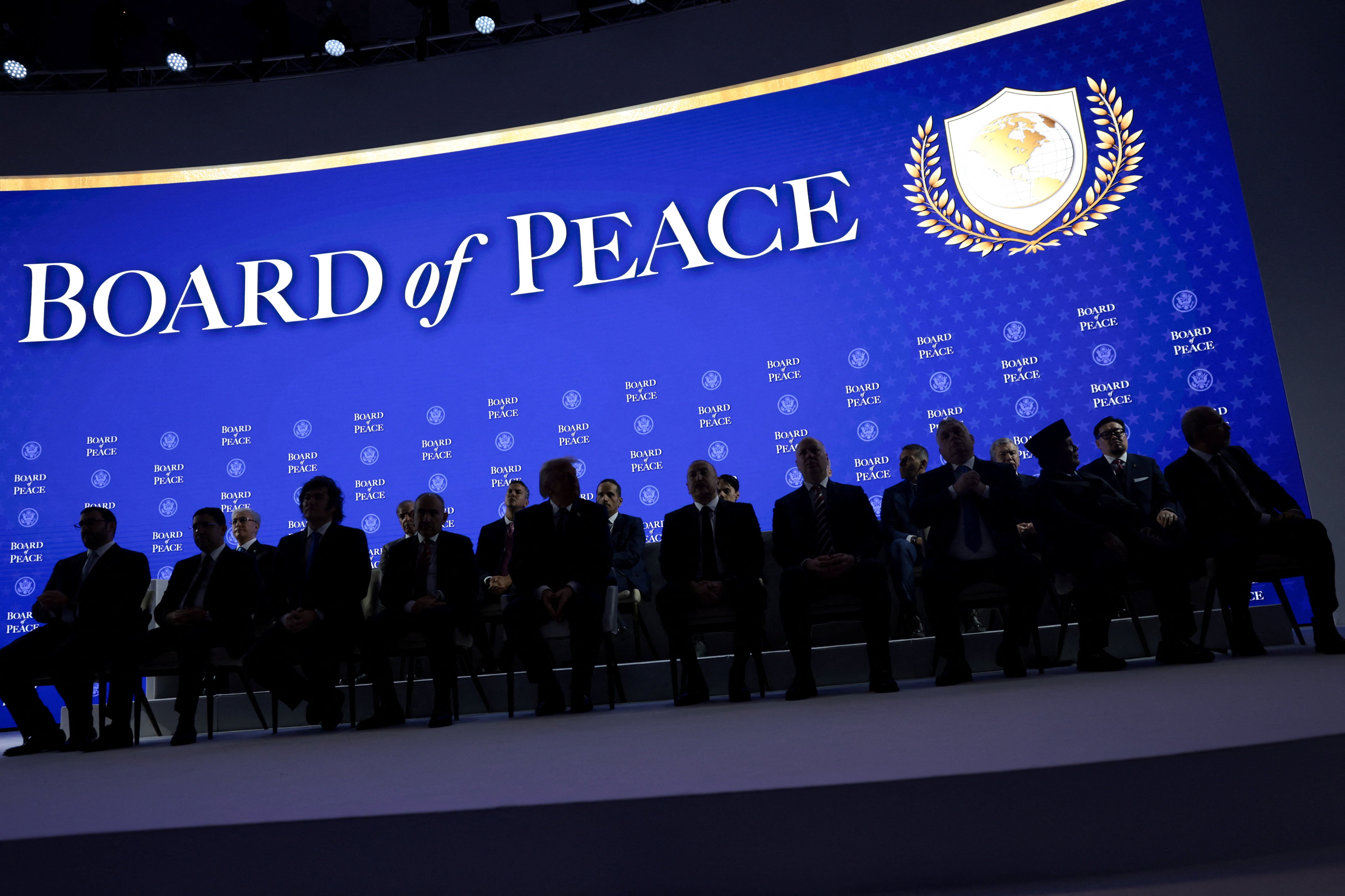 Trump and world leaders in front of a “Board of Peace” logo