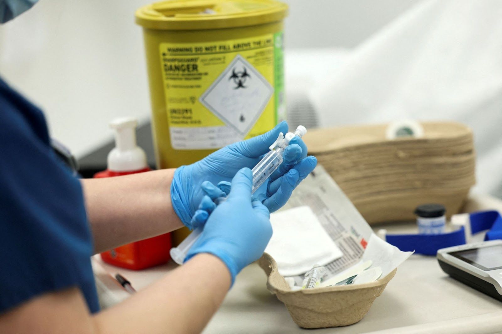 A lab worker at UCL. 