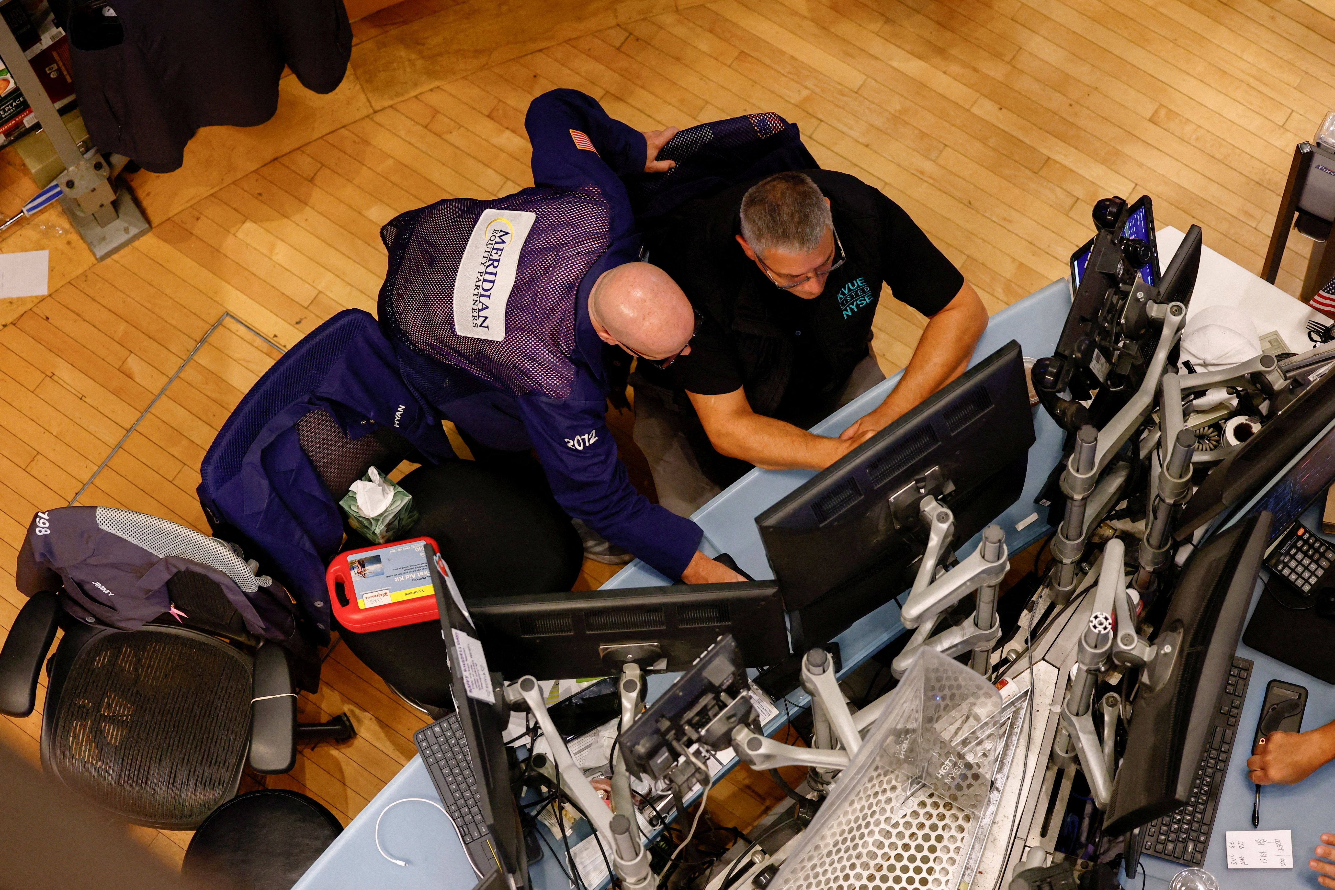  Traders work on the floor of the New York Stock Exchange (NYSE) in New York City, U.S.