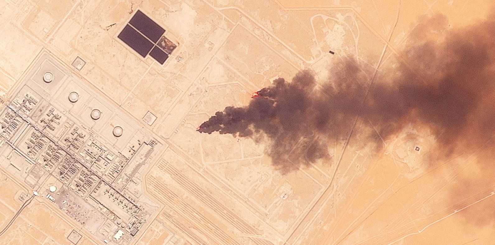 A satellite image shows smoke billowing near a Saudi oil facility serving the East-West Pipeline, in the Hejaz region, Saudi Arabia, Sept. 16, 2026