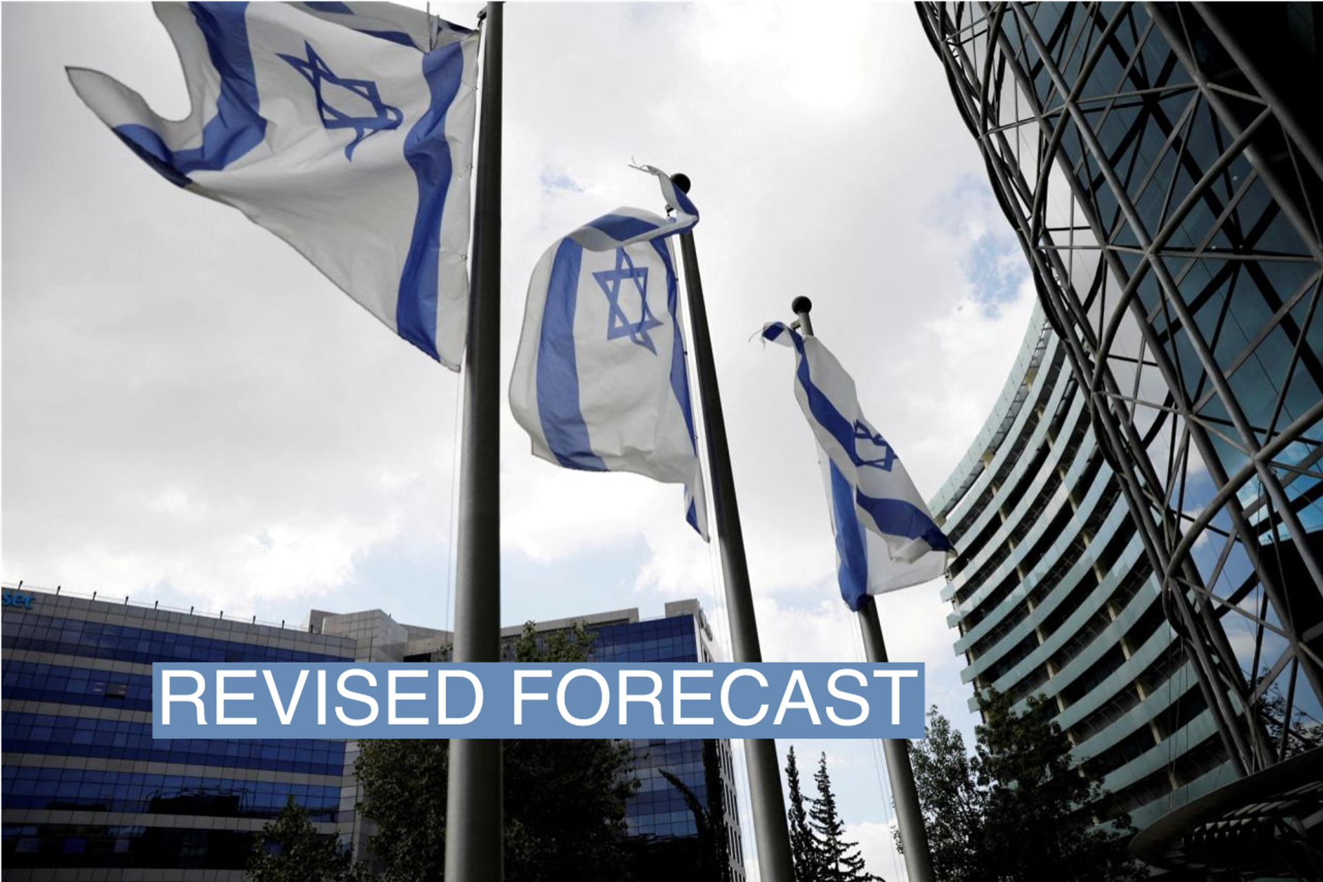 Israeli national flags flutter near office towers at a business park also housing high tech companies, at Ofer Park in Petah Tikva, Israel August 27, 2020. REUTERS/Ronen Zvulun/File Photo