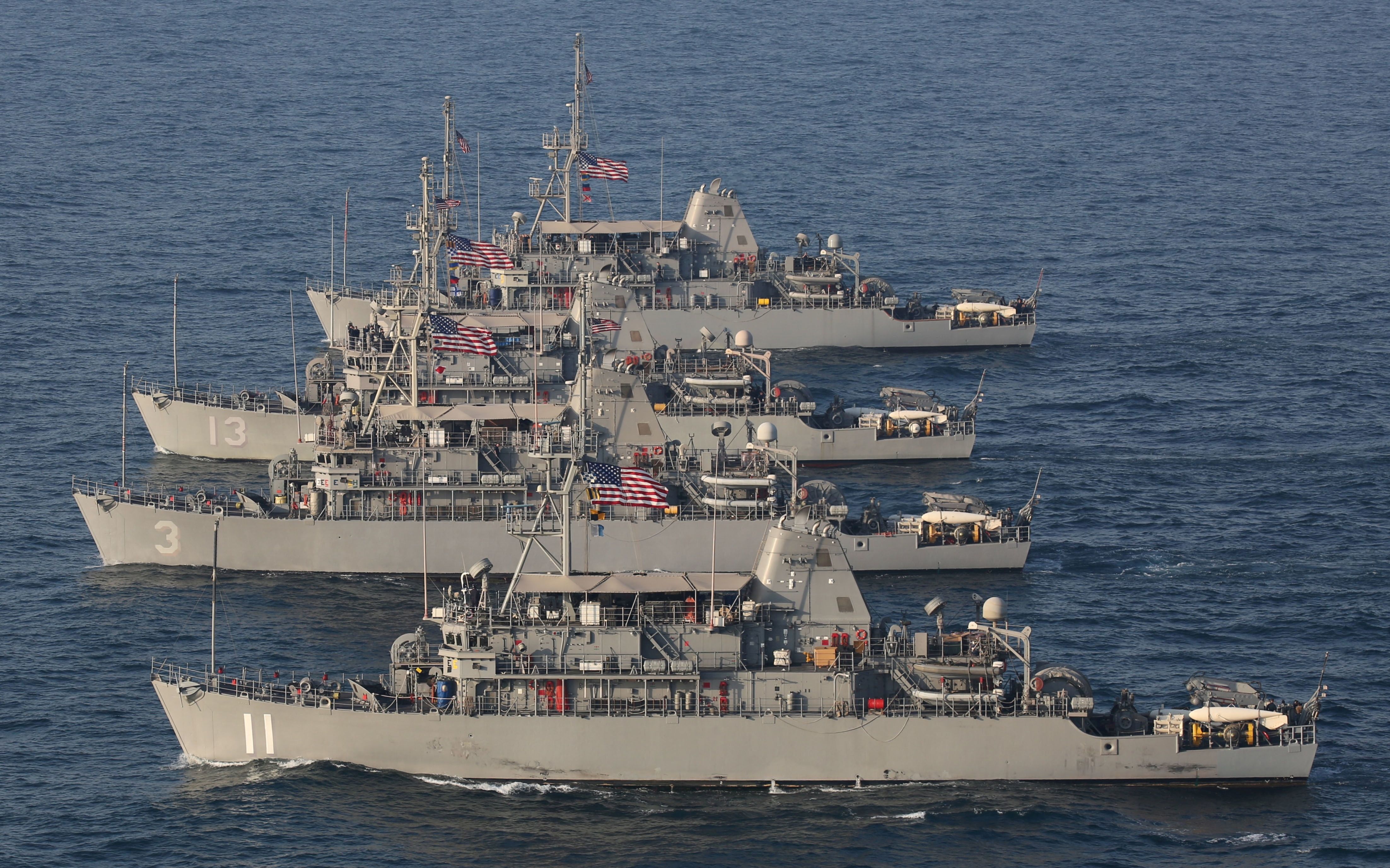 A formation of Avenger-class mine countermeasure ships