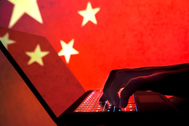 An illustration of a Chinese hacker.