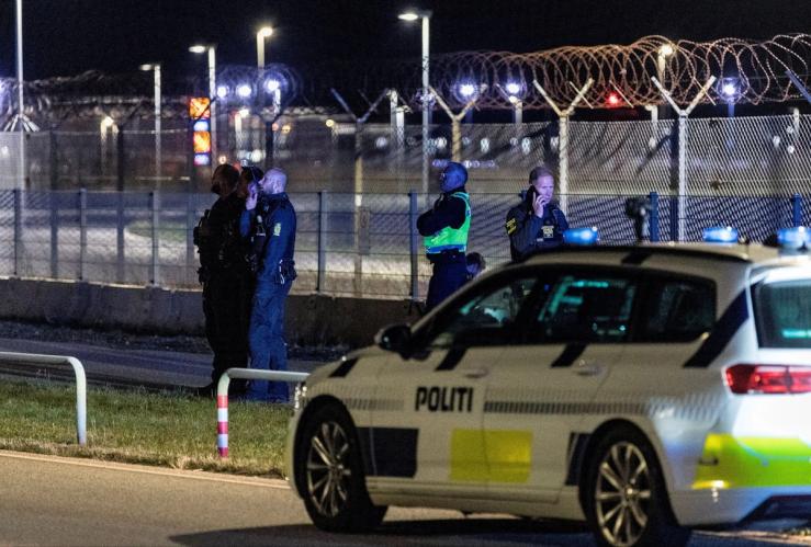 Police officers at the airport in Copenhagen.