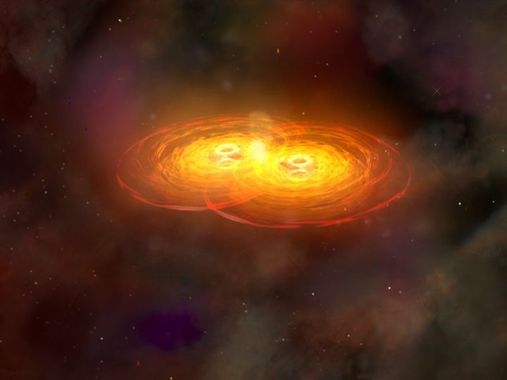 An artist’s rendering of black holes merging