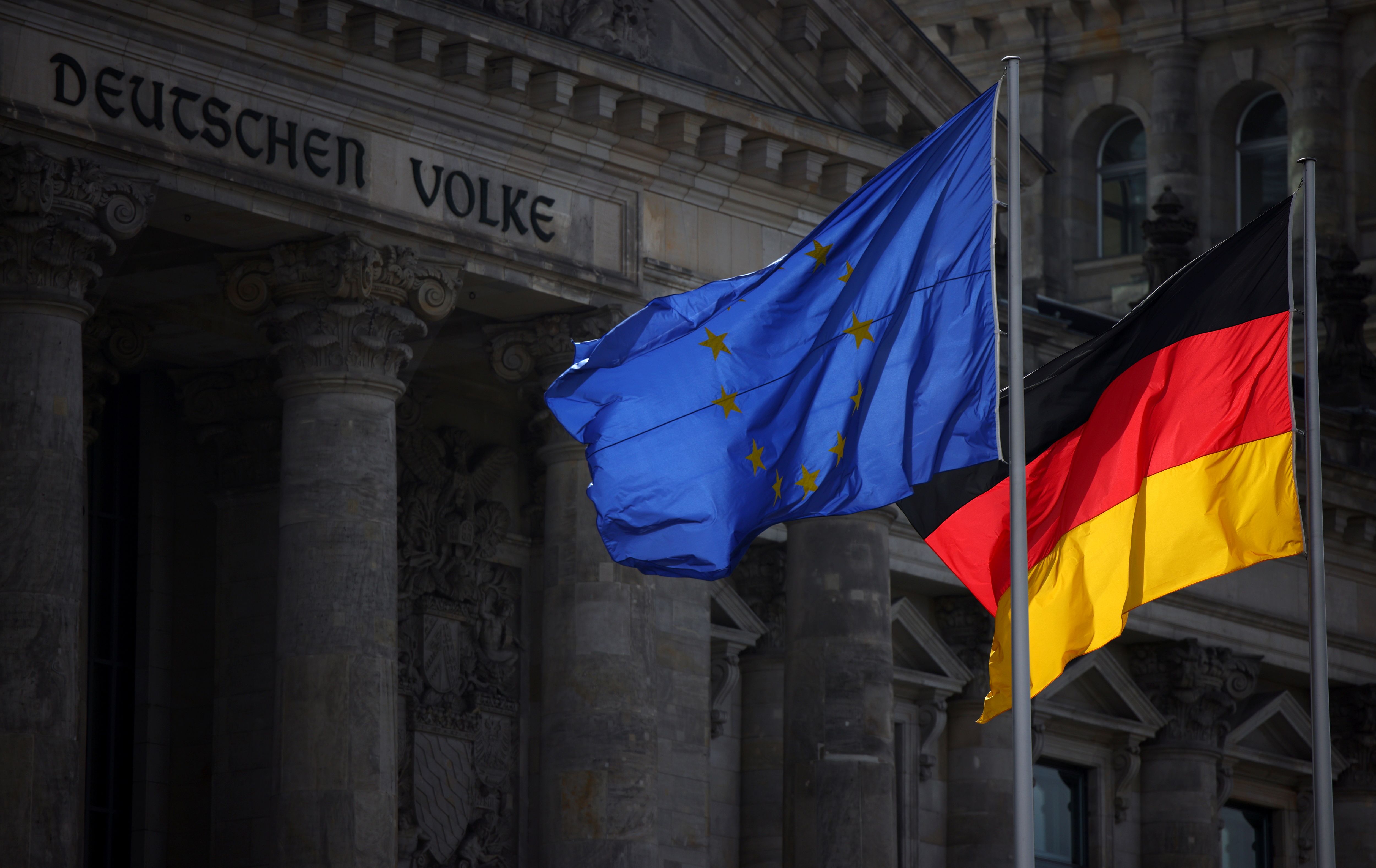 German and EU flags flying side by side