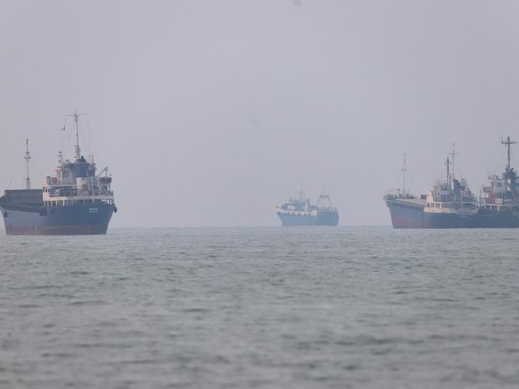 Vessels in the Strait of Hormuz near the beach of Bandar Abbas, Iran.