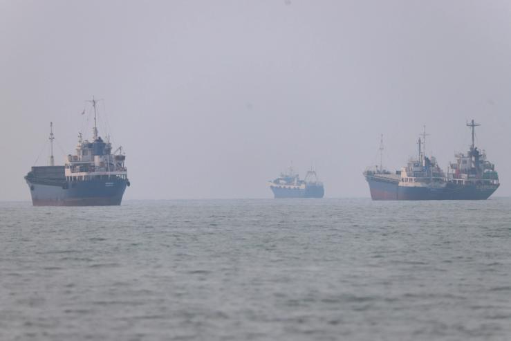 Vessels in the Strait of Hormuz near the beach of Bandar Abbas, Iran.