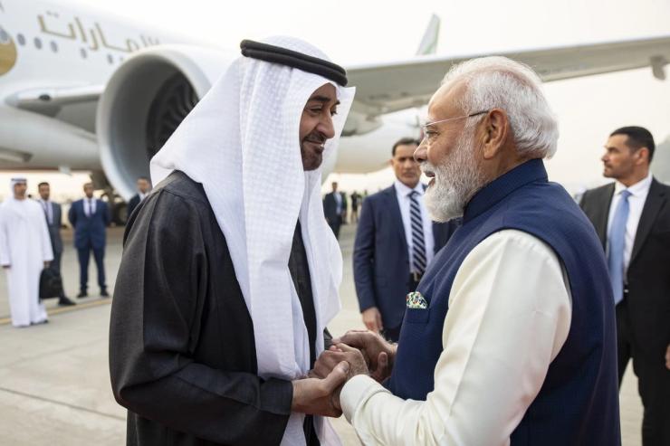 UAE President Sheikh Mohamed bin Zayed grasps hands with India’s Prime Minister Narendra Modi upon his arrival at the airport in New Delhi, India, Jan. 19, 2026.