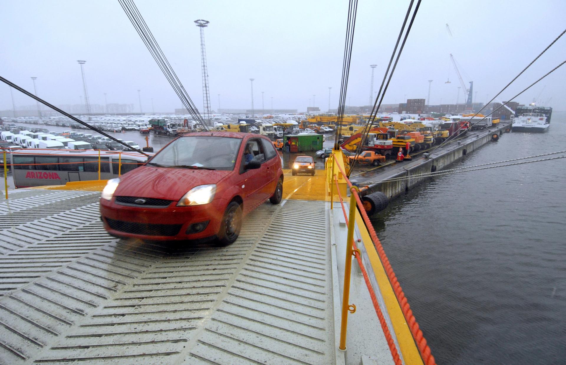 Ford cars are loaded onto the Grande Colonia cargo ship.