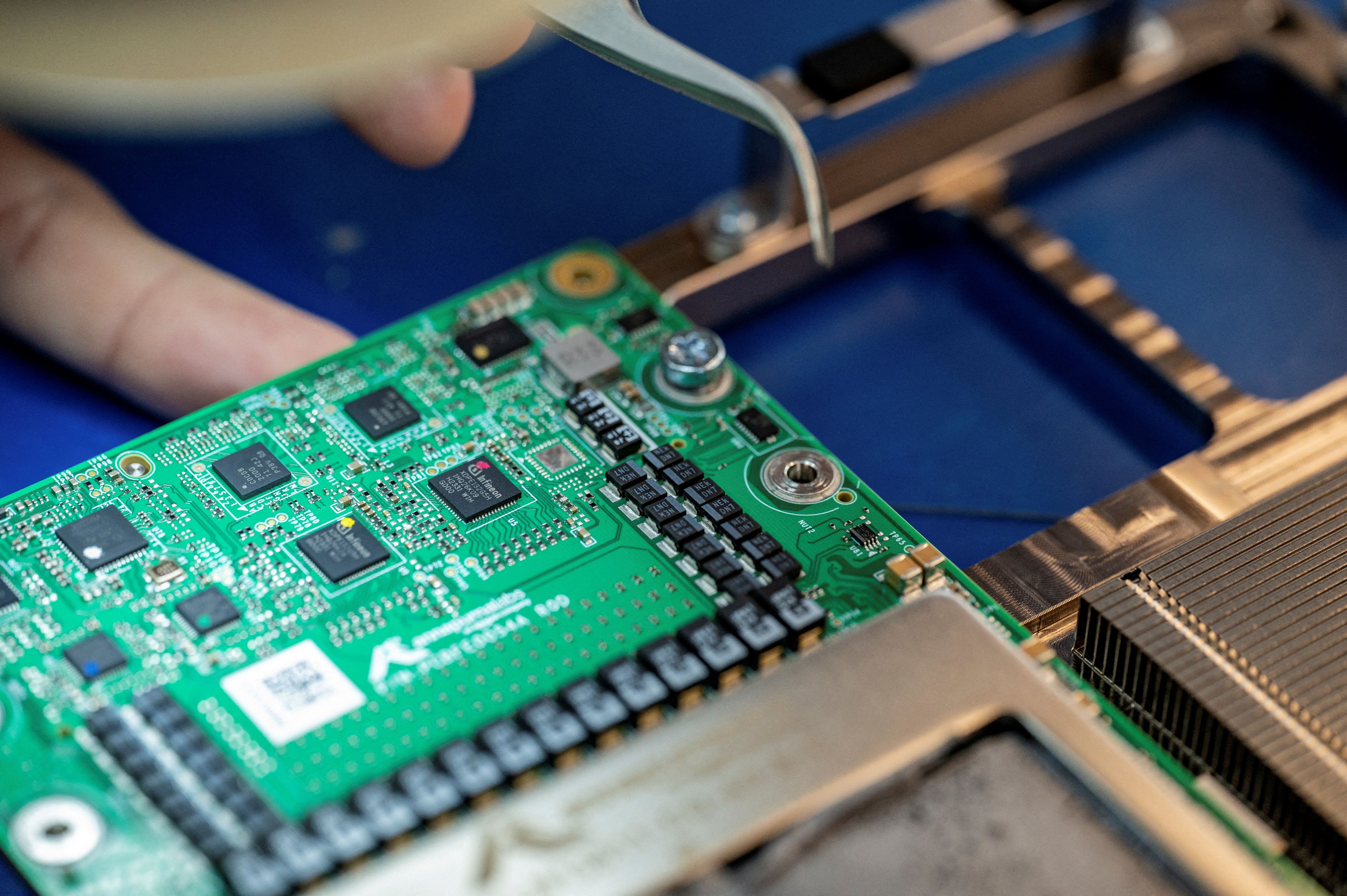 An Amazon chip is shown at a lab in Austin, Texas