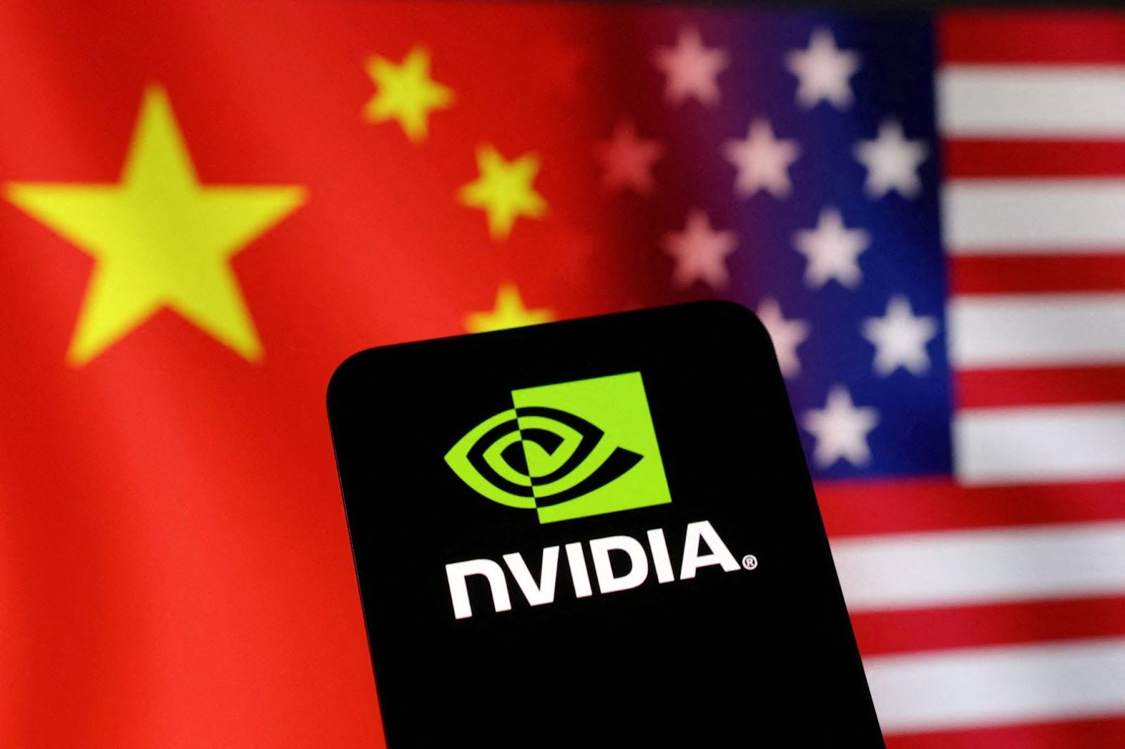 The Nvidia logo in front of US and Chinese flags
