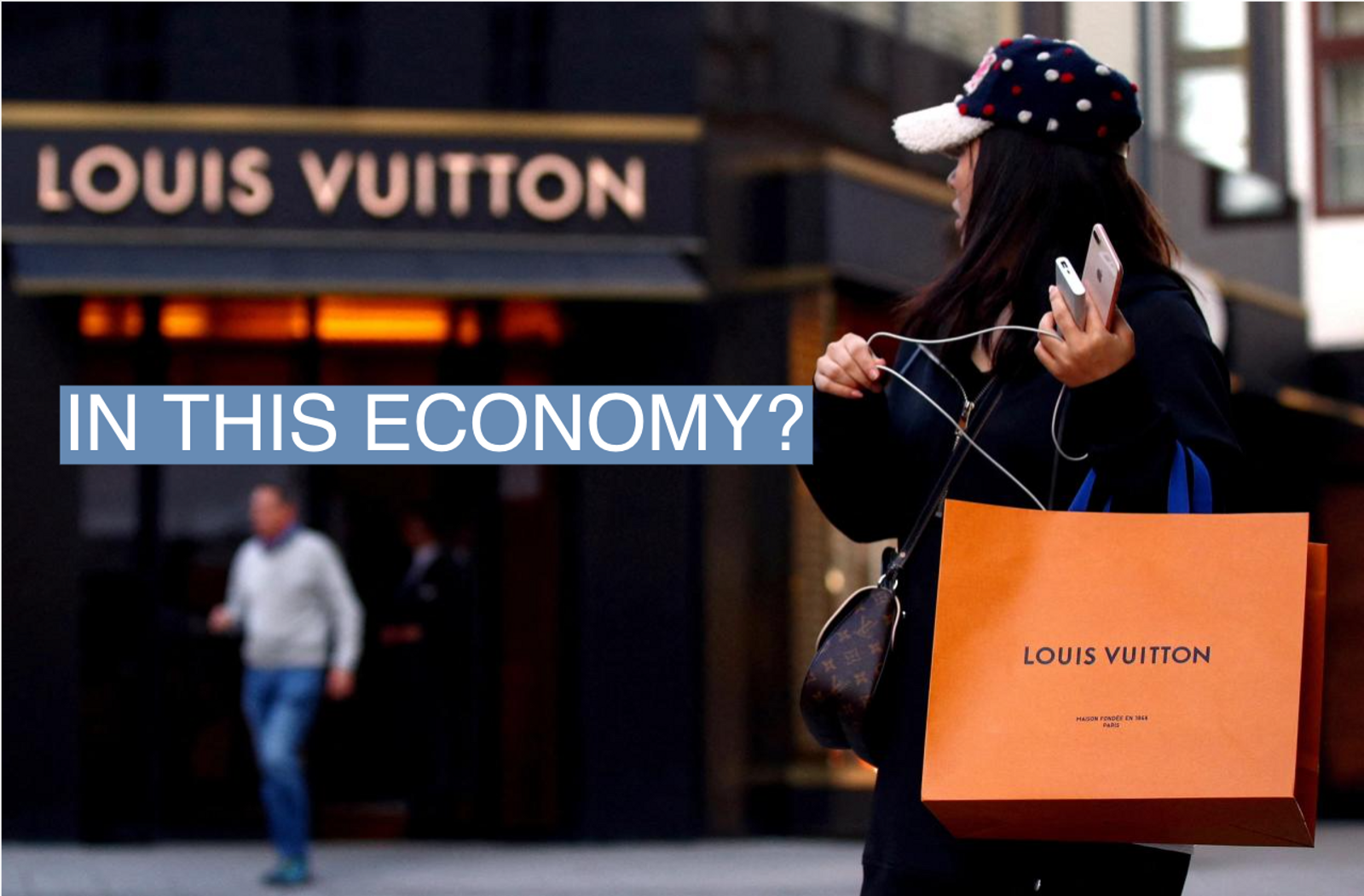  A woman with a Louis Vuitton-branded shopping bag in Vienna.