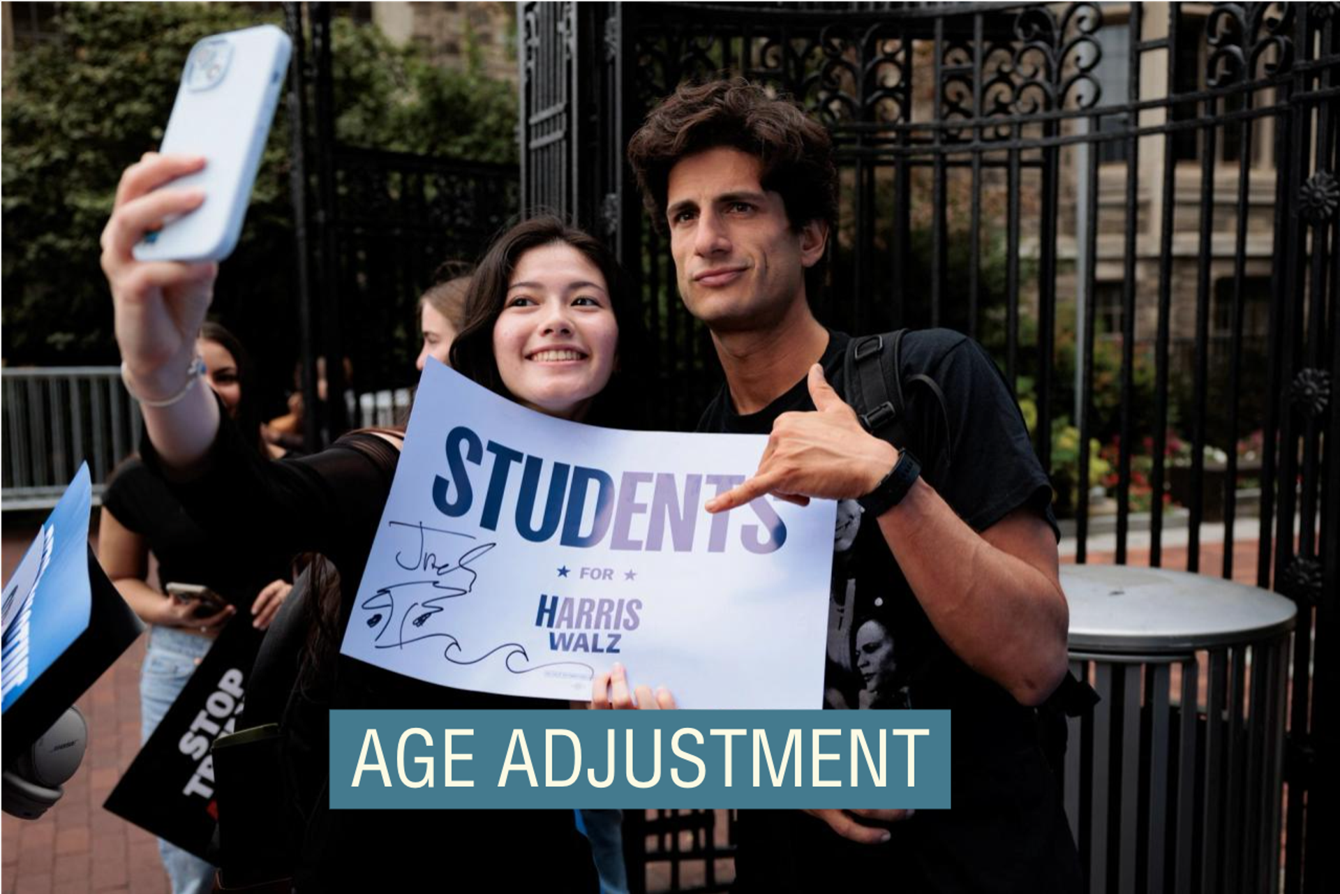 An attendee poses for a selfie with Jack Schlossberg, grandson of former U.S. President John F. Kennedy, during an event held by the Harris-Walz campaign