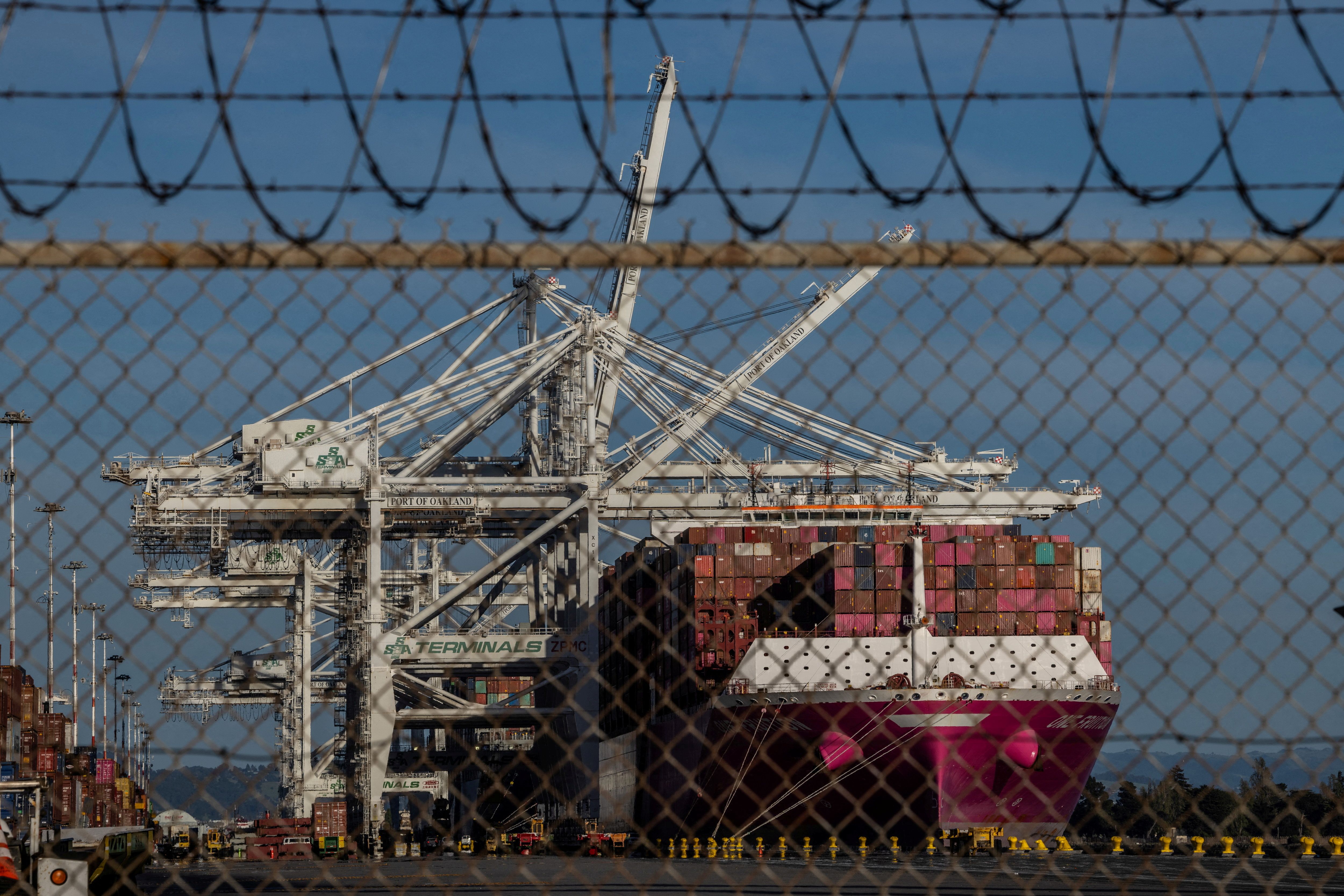 A cargo ship full of containers at the port of Oakland, California. 