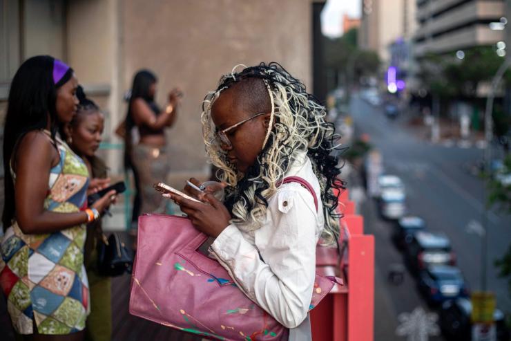 A woman on her phone in Johannesburg.