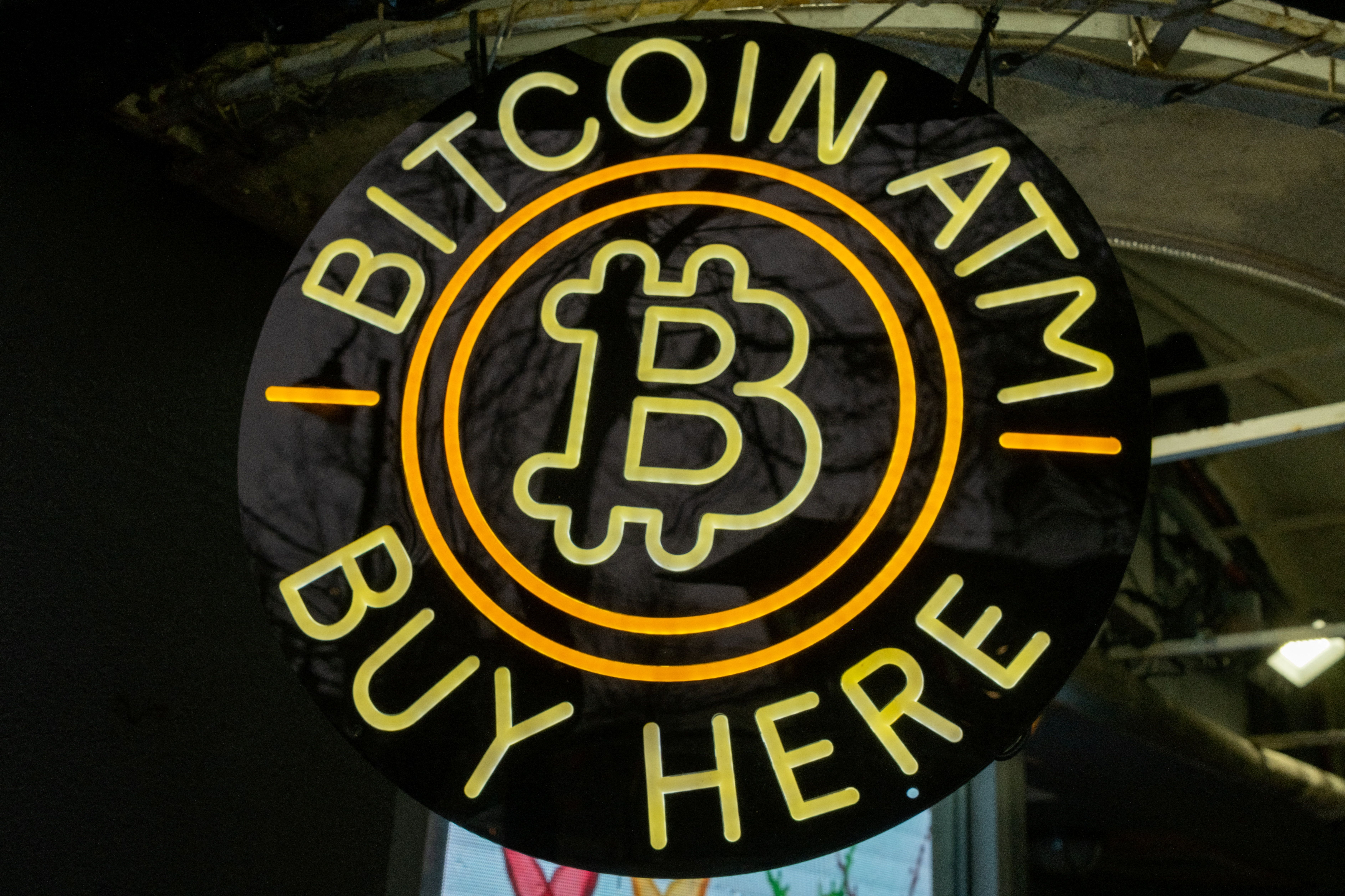 A Bitcoin ATM sign
