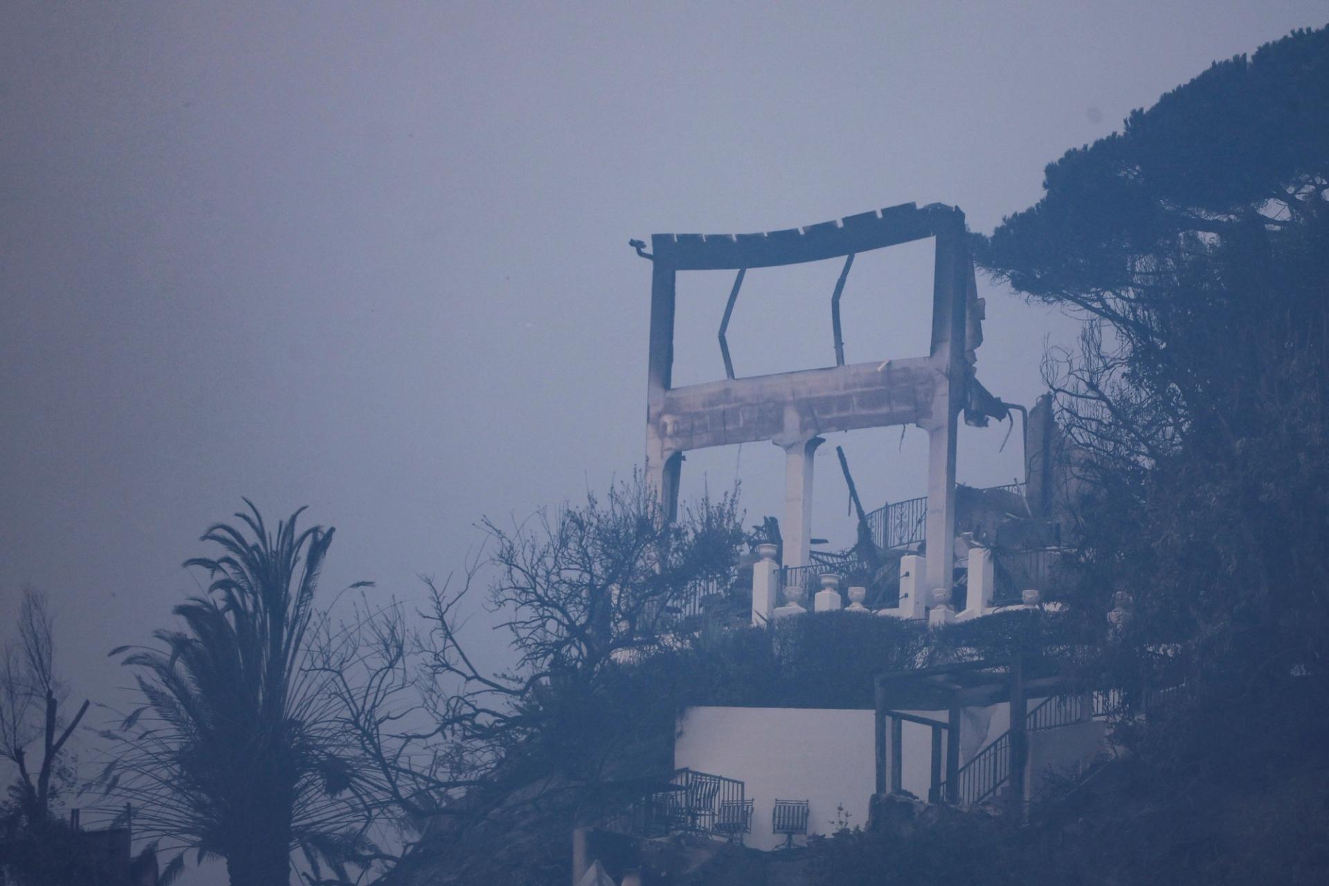 The remains of a burnt building on a hillside in Los Angeles.