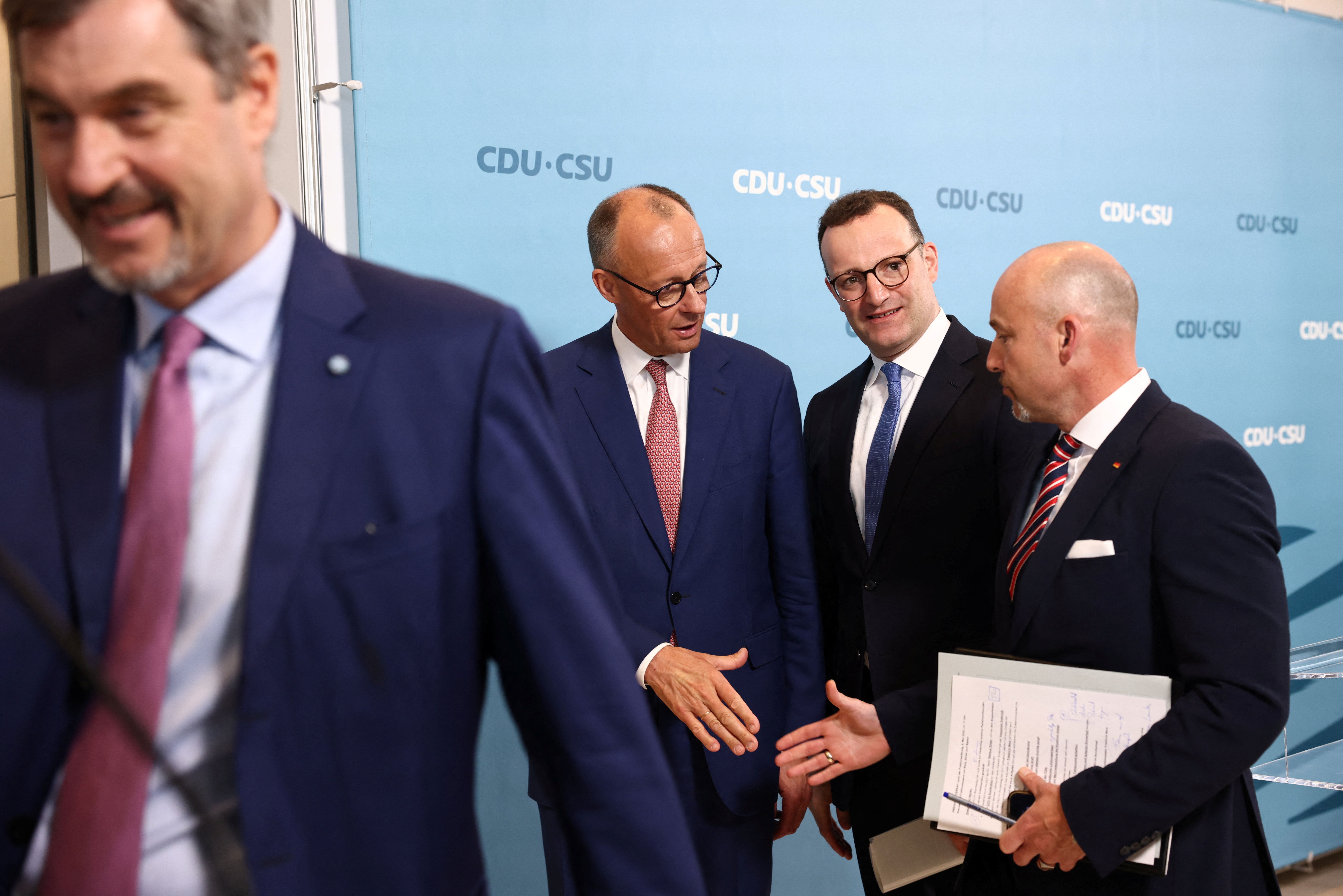 Alexander Hoffmann of CSU, Bavaria Premier Markus Soeder and federal leader of CSU, incoming German chancellor Friedrich Merz of CDU and Jens Spahn.