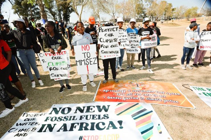 Demonstrators gathered with placards during a protest march