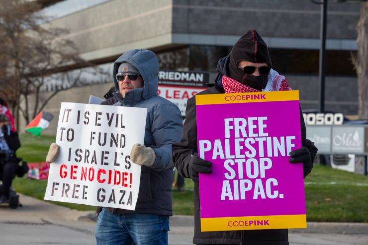 Protesters against Rep. Haley Stevens, D-Mich.