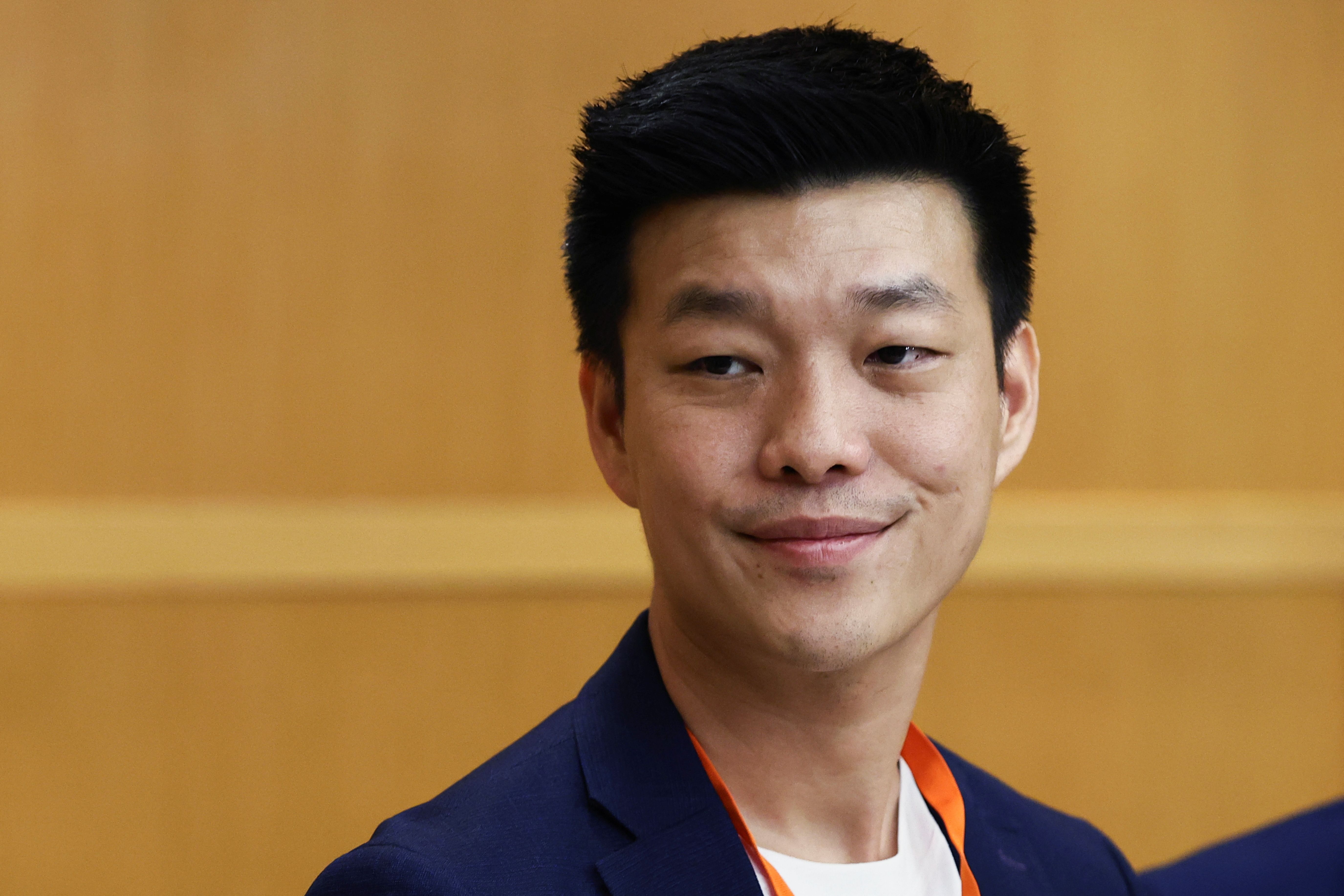 People’s Party leader, Natthaphong Ruengpanyawut looks on during a press conference, announcing a new political party following opposition Move Forward Party dissolution in Bangkok, Thailand, August 9, 2024. REUTERS/Chalinee Thirasupa
