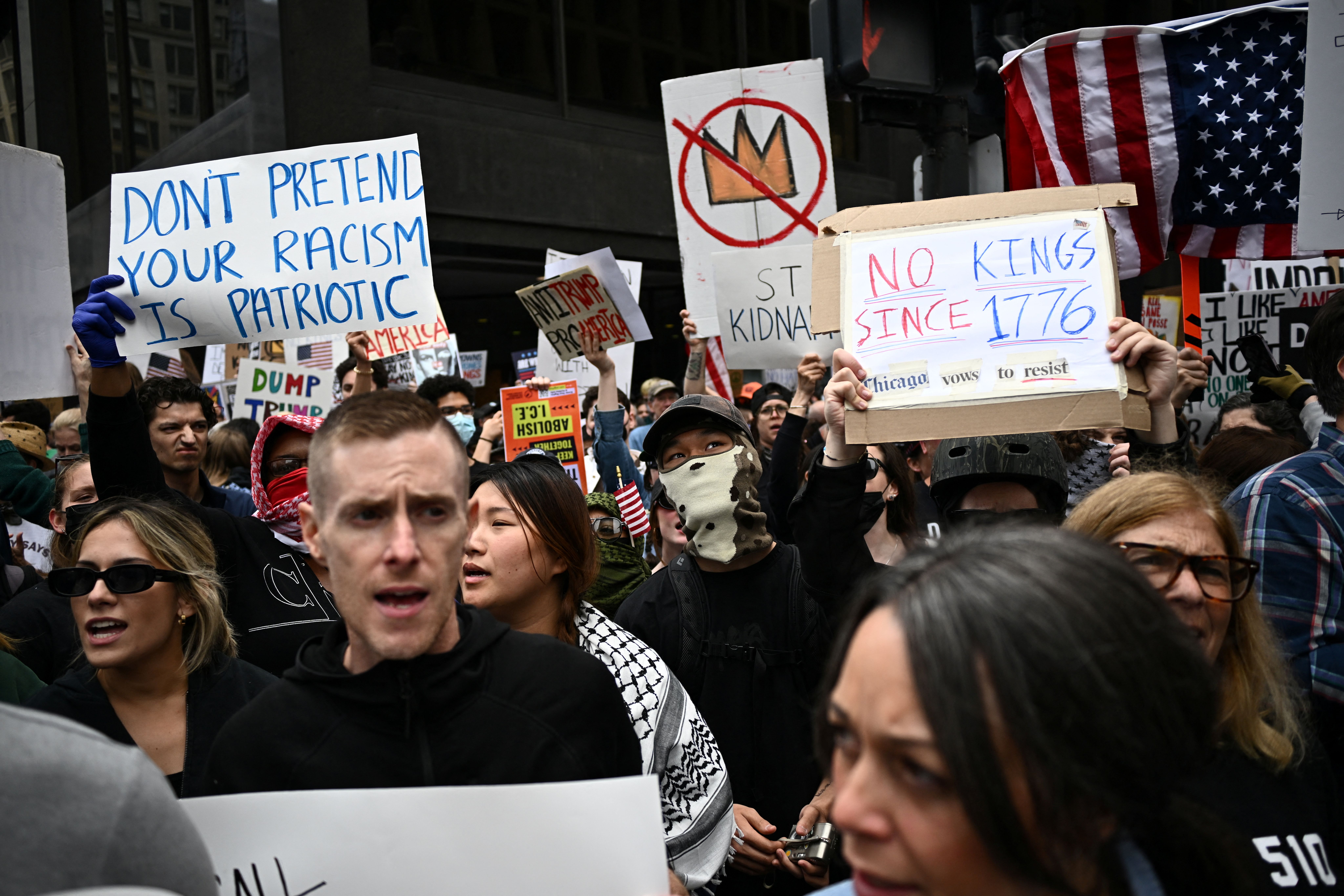 People participate in the “No Kings” protest against President Donald Trump’s policies, in Chicago, Illinois, U.S., June 14, 2025. 