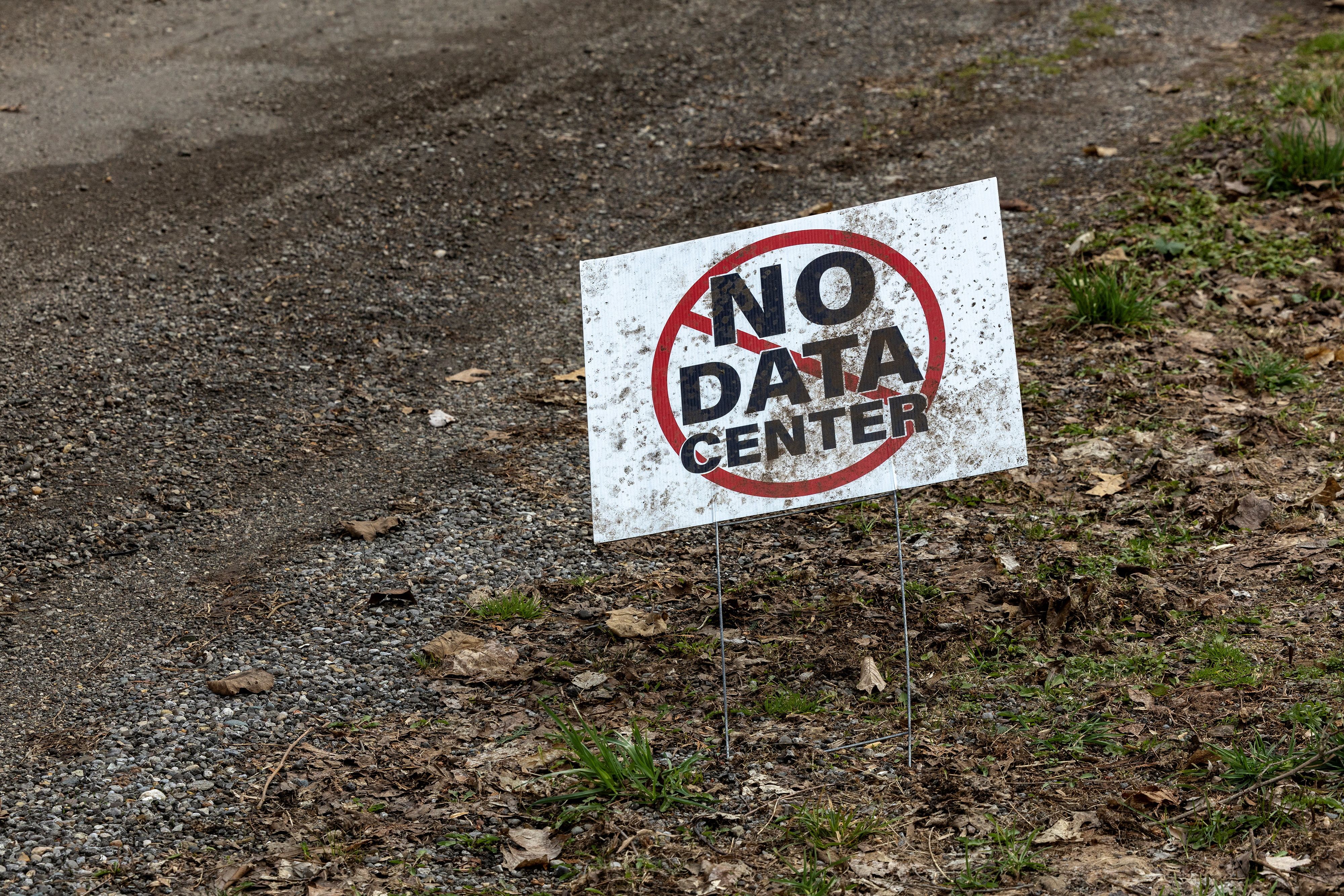 A sign that reads “No data center” sits outside a home in New Carlisle, Indiana. 